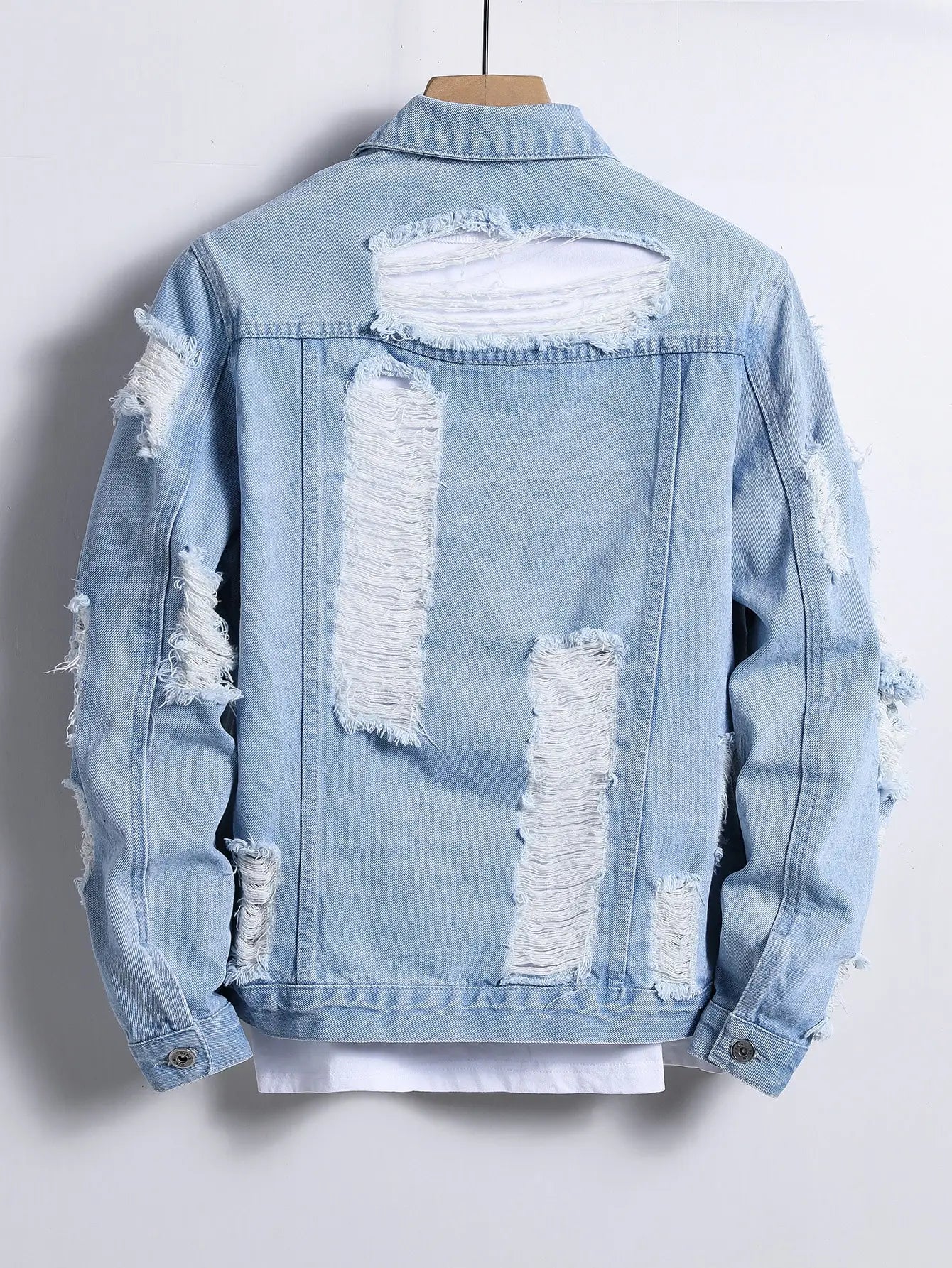 Light blue ripped denim jacket
