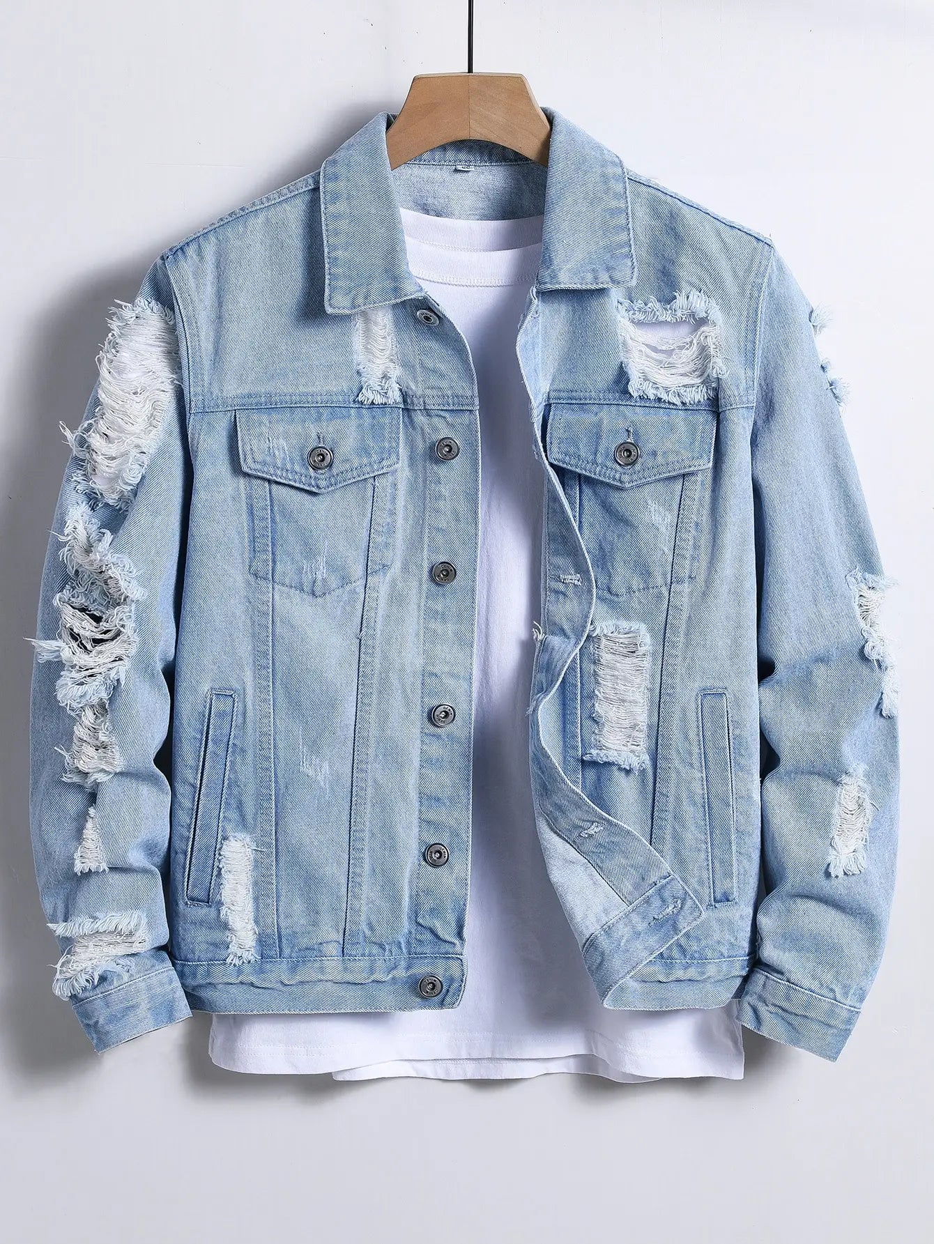 Light blue ripped denim jacket